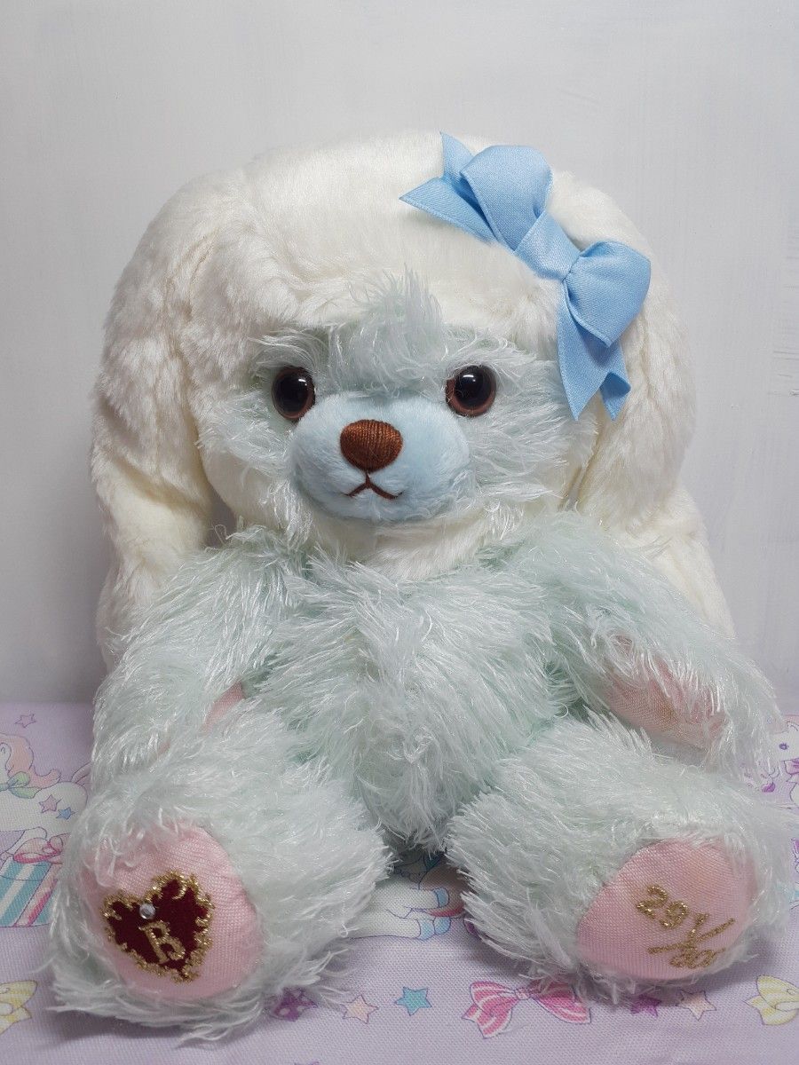 Preview of BABY, THE STARS SHINE BRIGHT Rabbit Bear (Saxophone Blue x White) Limited Edition of 300, with embroidered serial number, some stains present.