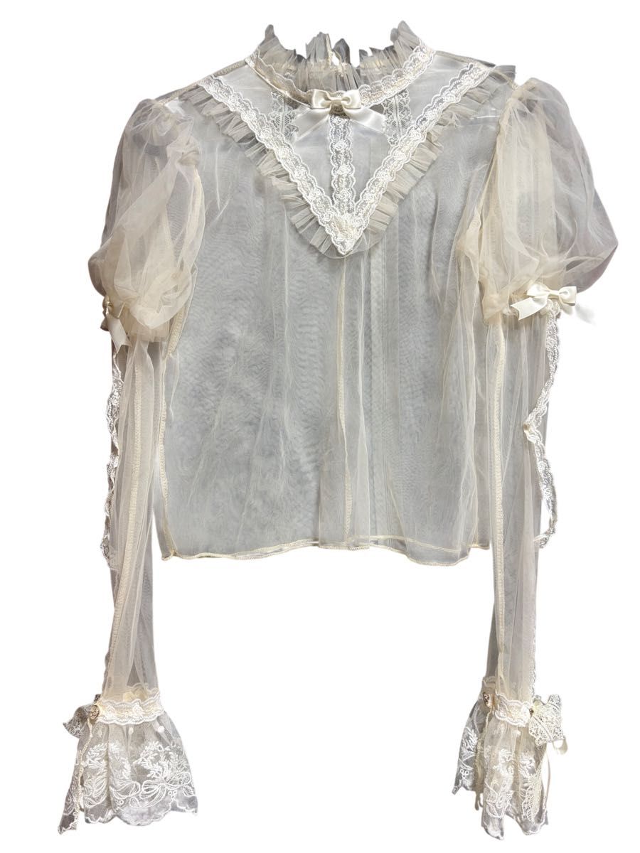 Preview of Lolita-style sheer lace blouse with frills and ribbons, long sleeves.