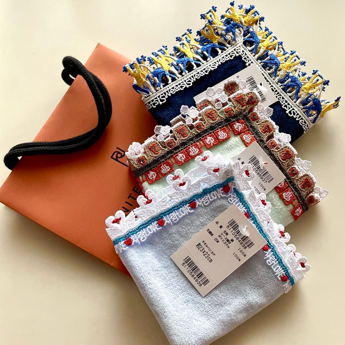 新品未使用】近沢レース シーズンタオルハンカチ ロールケーキ