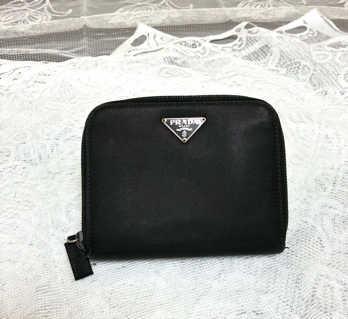 二つ折り財布 レザー ブラック メタルロゴ PRADA プラダ 財布 二つ折り