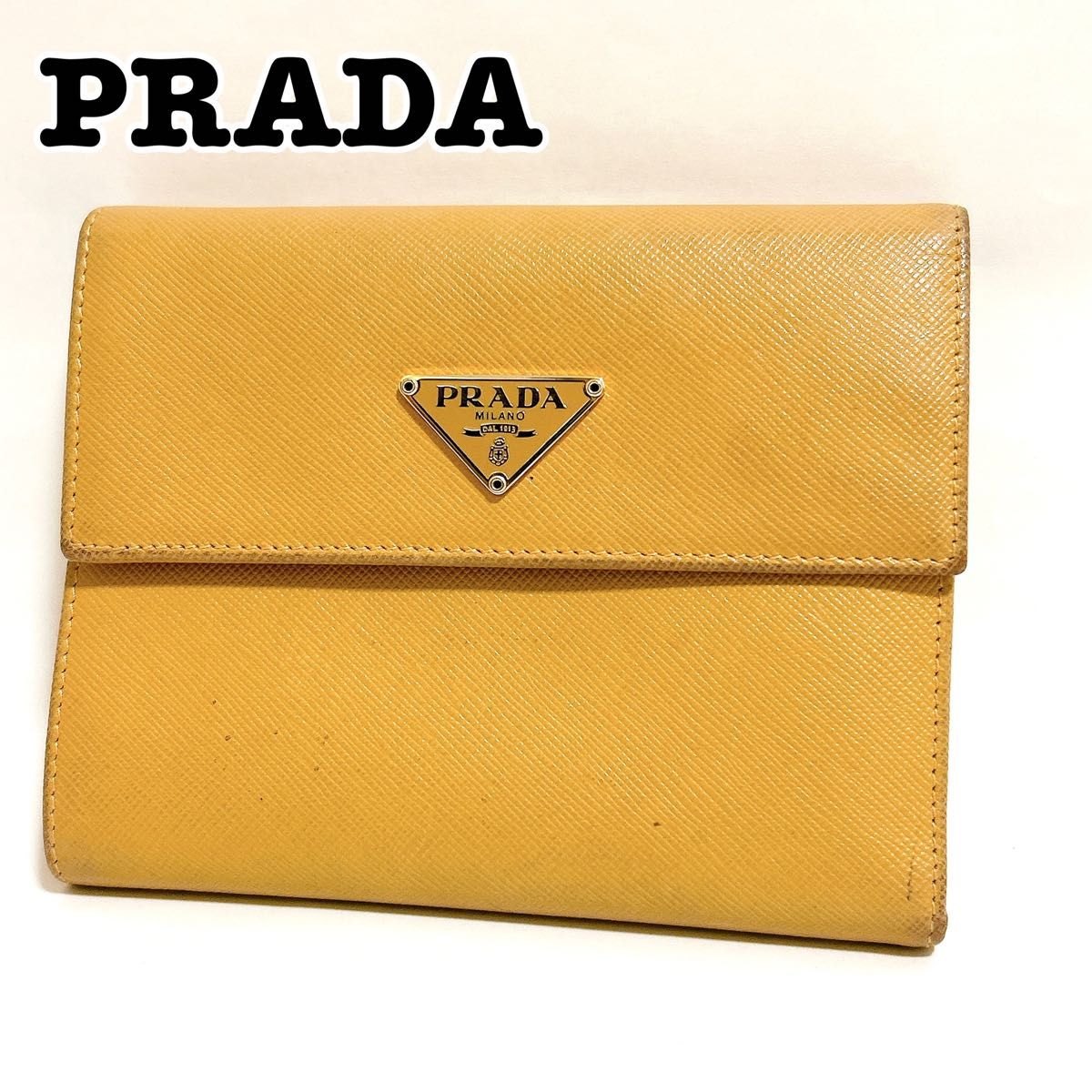 PRADA プラダ 三つ折り ミニ財布 ブラック ゴールドロゴ | Shop at