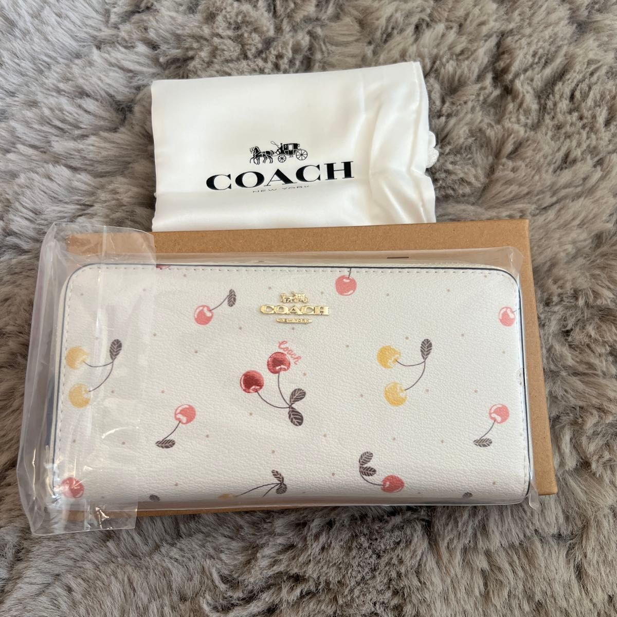 美品》COACH(コーチ)長財布 ラウンド シグネチャー | Shop at 