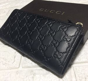 正規品/鑑定済みGUCCIシマGG/L字スリムラウンドジップ長財布/外装ブラックリカラー品/型番295617