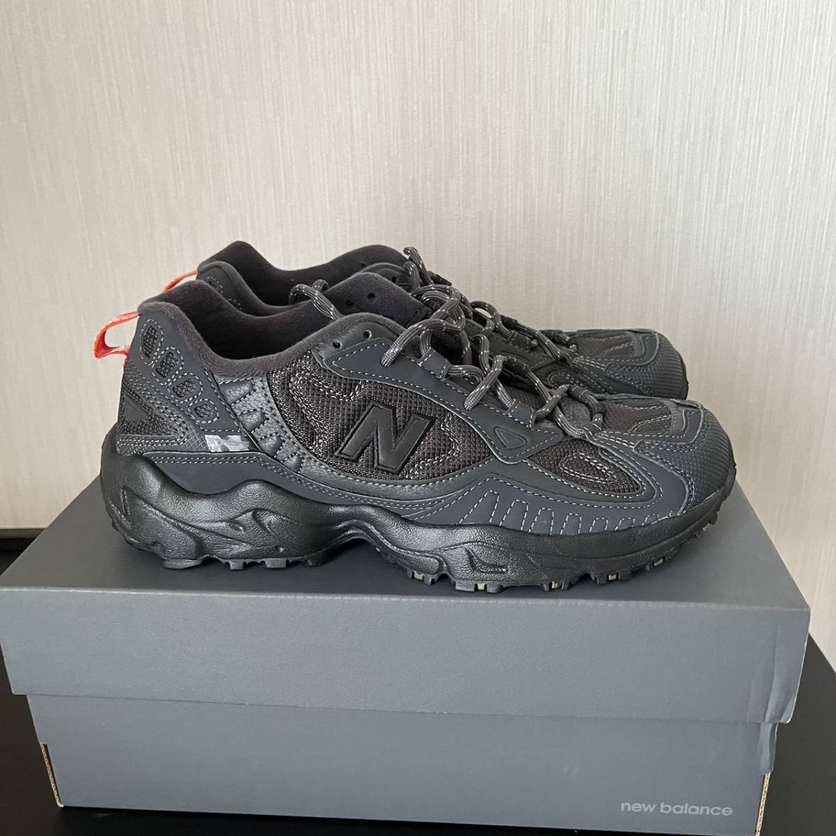 NB703